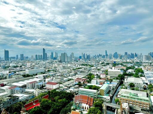 Panoramic view of a city skyline with several high-rise buildings