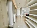 Modern apartment hallway with view into the kitchen