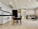 Modern open-concept living area with kitchen and dining space