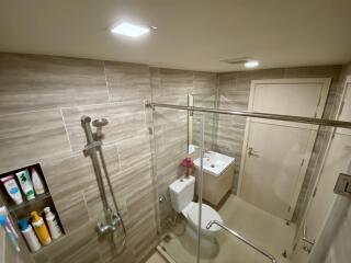 Modern bathroom with shower and vanity unit