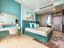 Elegant bedroom with teal decor and modern furnishings