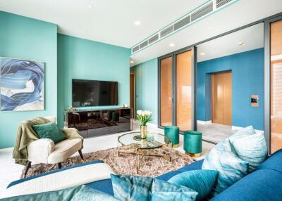 Modern living room with teal accents