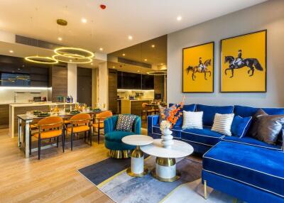 Modern living room and kitchen with blue and yellow decor