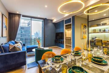 Modern living and dining area with stylish decor and city view