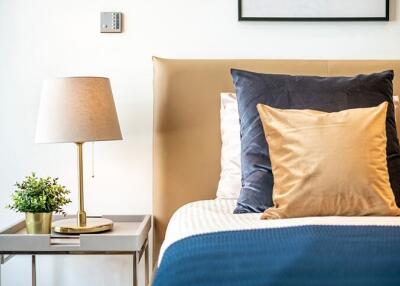 Cozy modern bedroom with a side table