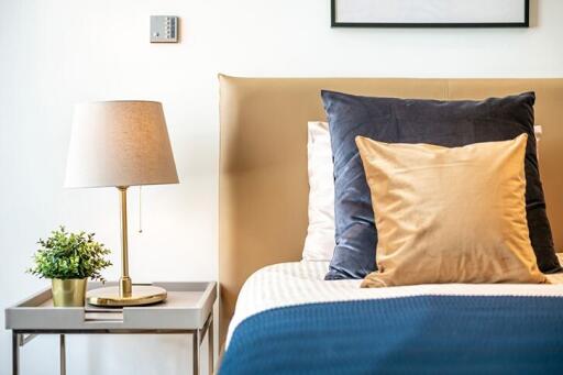 Cozy modern bedroom with a side table