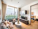 Modern living room with a view of the city, adjacent to a bedroom