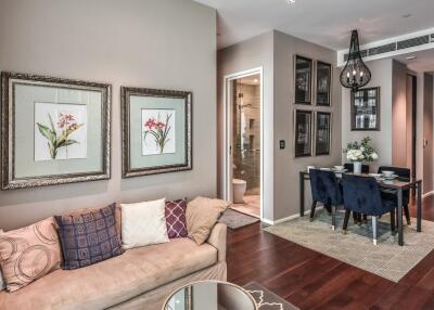 Elegant living room with modern decor and dining area