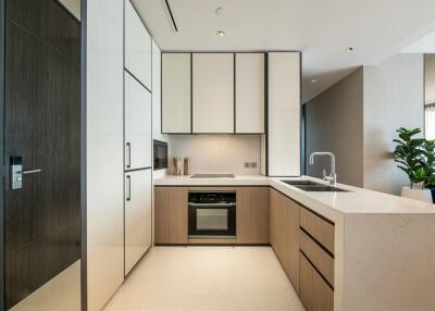 Modern kitchen with white and wood finishes