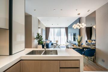 Modern living and dining area with open kitchen