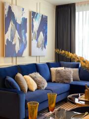 Stylish living room with blue couch and modern decor