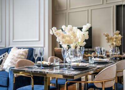 Elegant dining area with table setup for an intimate meal