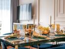 Elegant dining room with a well-set table, golden utensils and a modern TV in the background