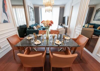 Elegant dining area with a six-seater table and stylish decor