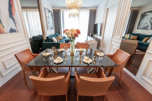 Elegant dining area with a six-seater table and stylish decor