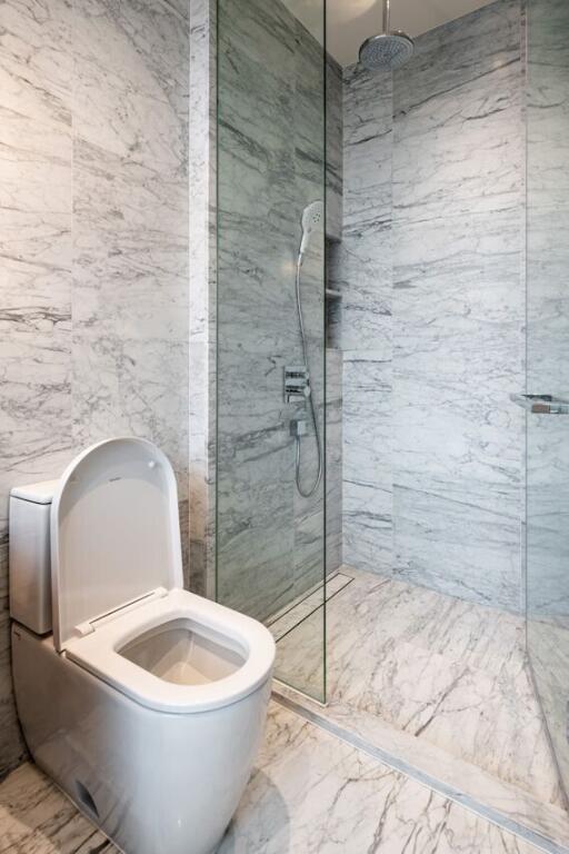 Modern bathroom with toilet and shower