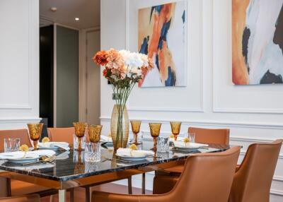 Modern dining room with stylish decor and table setting