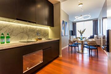 Modern kitchen and living room with dining area