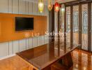 Modern dining room with wooden table and decorative lighting