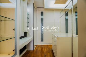 Spacious walk-in closet with ample storage and modern design