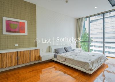 Modern bedroom with large window