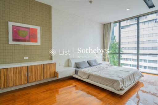 Modern bedroom with large window