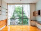 Bright living room with large windows and built-in shelves and drawers