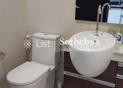 Modern bathroom with sleek toilet and sink