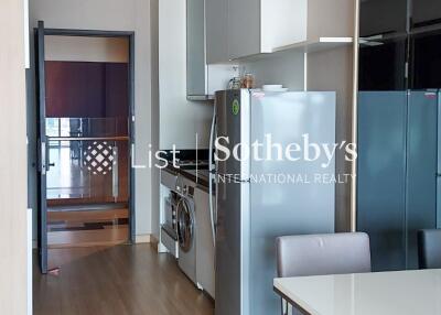 Modern kitchen with integrated laundry appliances