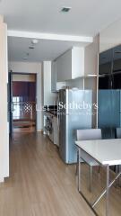 Modern kitchen with integrated laundry appliances