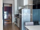 Modern kitchen with integrated laundry appliances