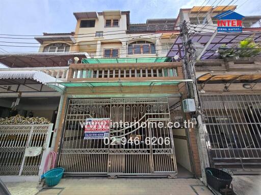 Front view of a multi-story townhouse