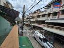 Street view from balcony of residential neighborhood