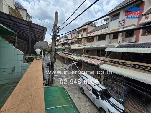 Street view from balcony of residential neighborhood