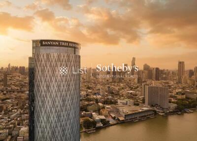 Skyline view of a city with the Banyan Tree Residences building in the foreground