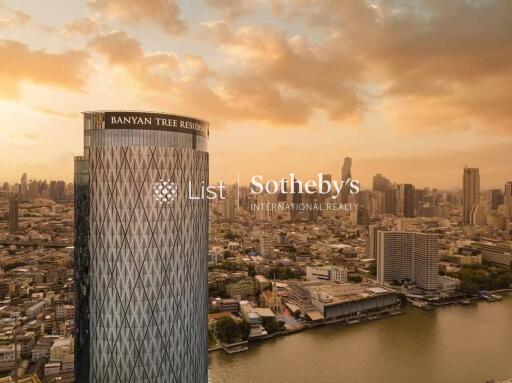 Skyline view of a city with the Banyan Tree Residences building in the foreground