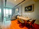 Modern living room with dining table and chairs, featuring wooden flooring and balcony view