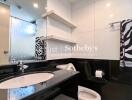 Modern bathroom with black and white decor