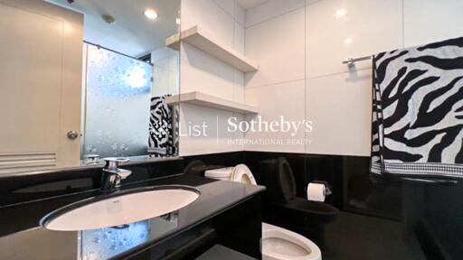 Modern bathroom with black and white decor