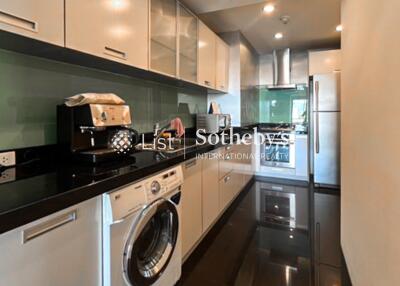 Modern kitchen with appliances and washing machine