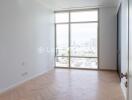 Bright bedroom with large floor-to-ceiling window