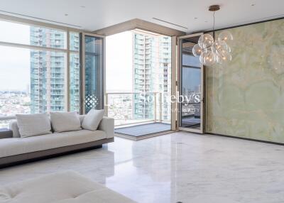 Modern living room with large windows and city view