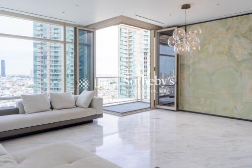 Modern living room with large windows and city view