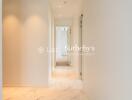 Bright hallway with marble flooring