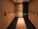 Luxury changing room with wooden lockers and dim lighting