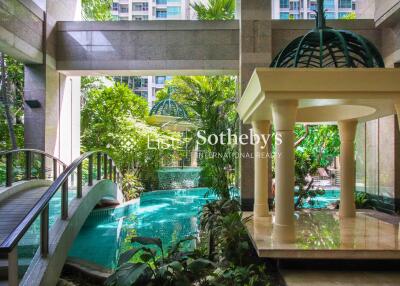 Luxury apartment building with indoor pool and garden