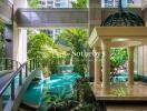 Luxury apartment building with indoor pool and garden