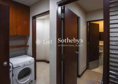 Laundry and utility area with washing machine