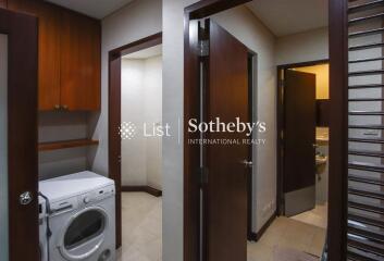 Laundry and utility area with washing machine