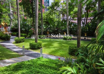 Beautiful outdoor garden with lush greenery and a walking path